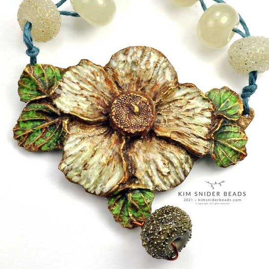 Bronze blossom focal, a one of a kind art bead created in 2021