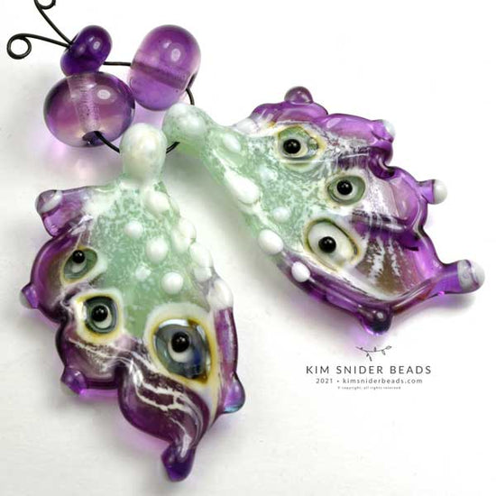 Kim Snider glass lampwork butterfly wing beads measure about 40mm long. Kim's butterfly wing beads are used by jewelry designers worldwide.