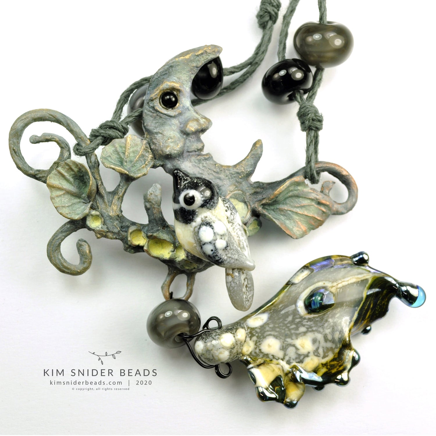 Moon focal art bead, bronze and glass - copyright Kim Snider