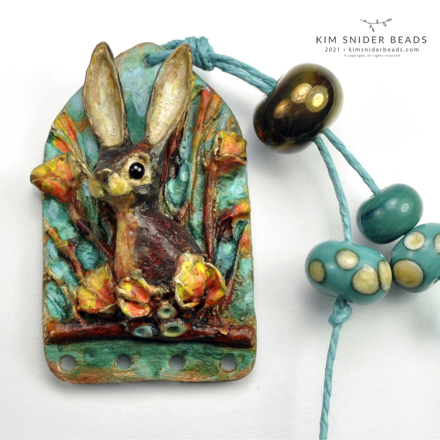 Bunny focal artbead, bronze and glass - copyright Kim Snider