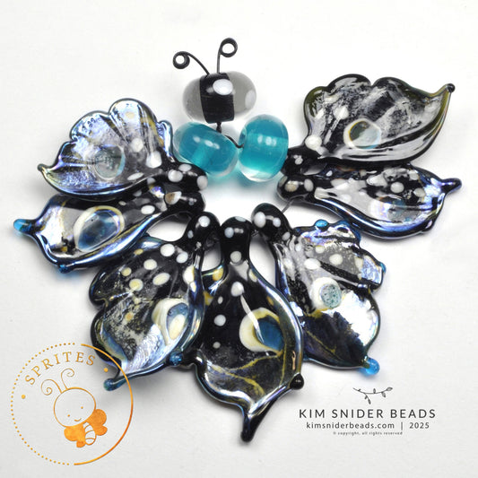Decorative glass beads shaped like butterflies on a white background with 'Sprites' branding.